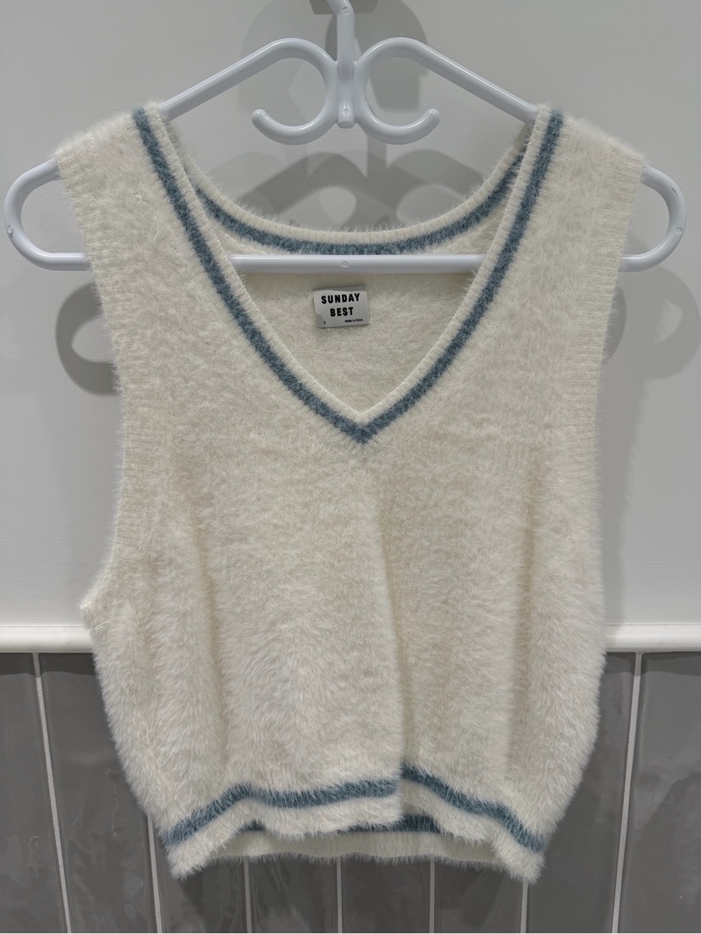 Cream V-Neck Sweater Vest with Light Blue Trim